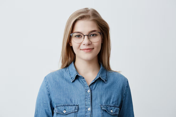 files/horizontal-portrait-smiling-happy-young-pleasant-looking-female-wears-denim-shirt-stylish-glasses-with-straight-blonde-hair-expresses-positiveness-poses_176420-13176.avif